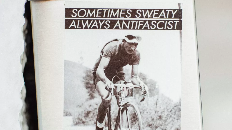 A photo of a cyclist with the heading "Sometimes sweaty, always antifascist"