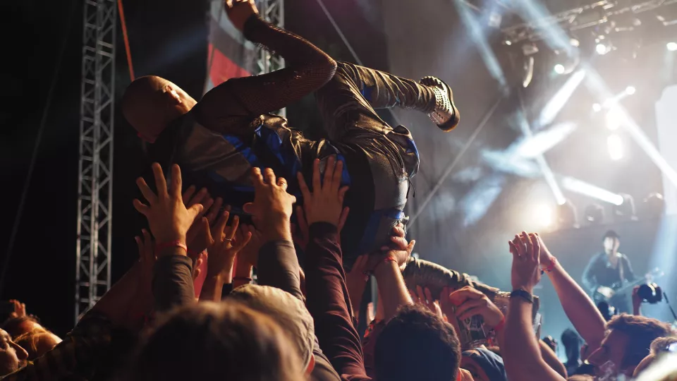 Stock photo of person crowd surfing