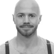 Portrait of Sam Fraser in black and white.