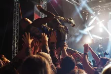 Stock photo of person crowd surfing