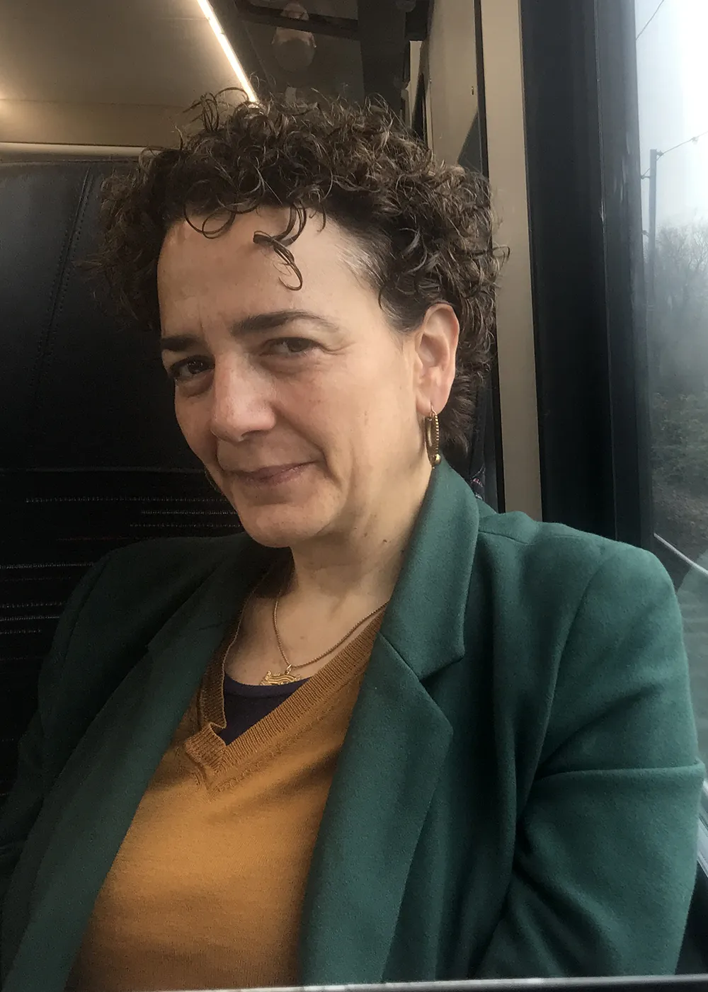 Yael Navaro in a train carriage.