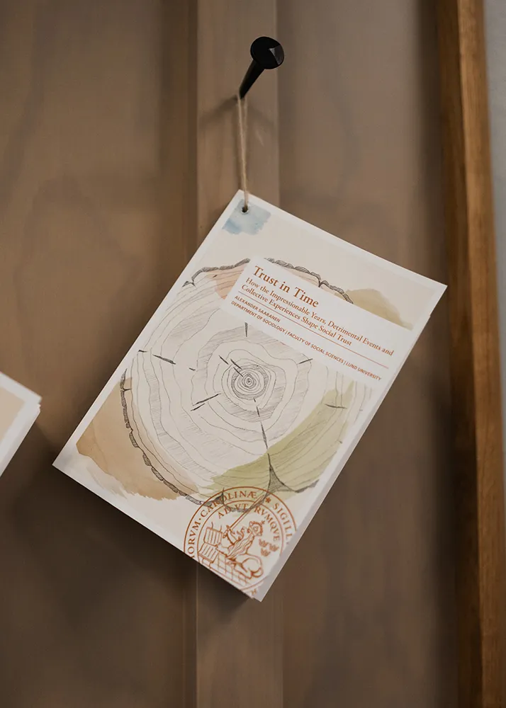 The thesis book nailed to a board.