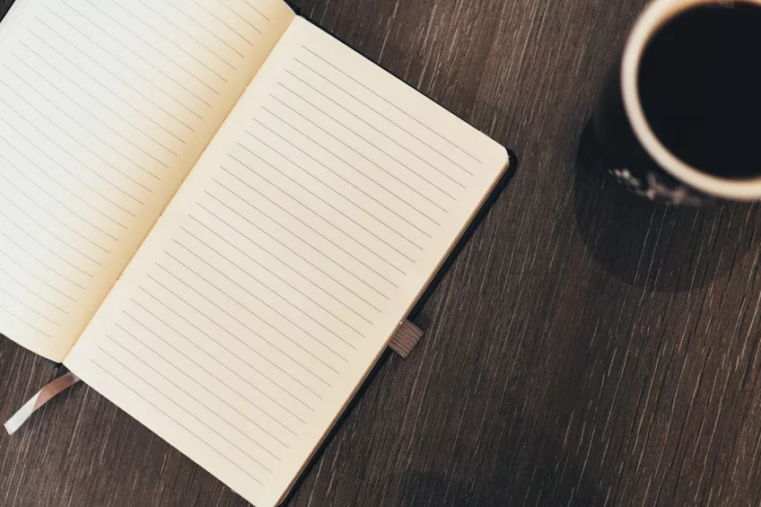 notepad and coffee cup. Photo: Pixabay. 