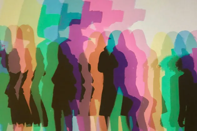 sarah-sheedy-unsplash.jpg Abstract shapes of people in different colours.
